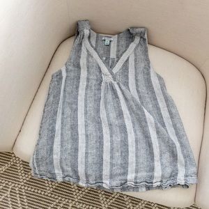 Sleeveless Black and White blouse.